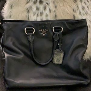 Black Prada shoulder bag.